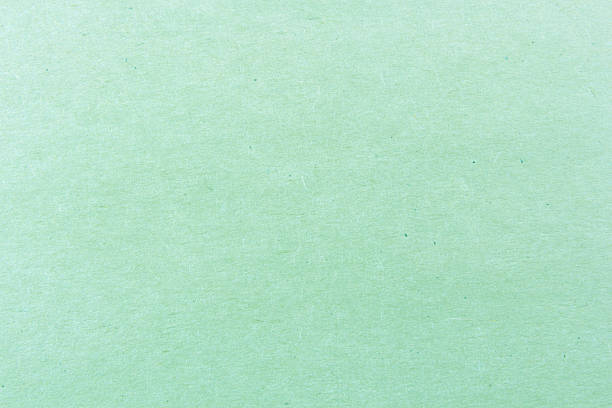 istock Close-up shot of light green paper texture pattern for backgroun 488975403