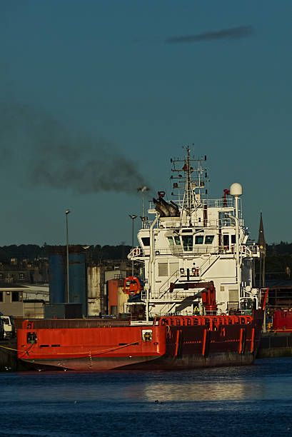 istock Oil tug in harbor. 488975589