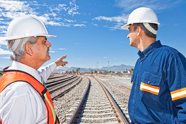 istock Engineer and Businessman at Railroad Construction 488976029