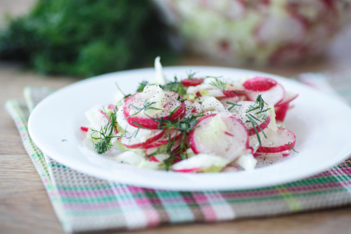 spring salad with radishes and cabbage on a plate
