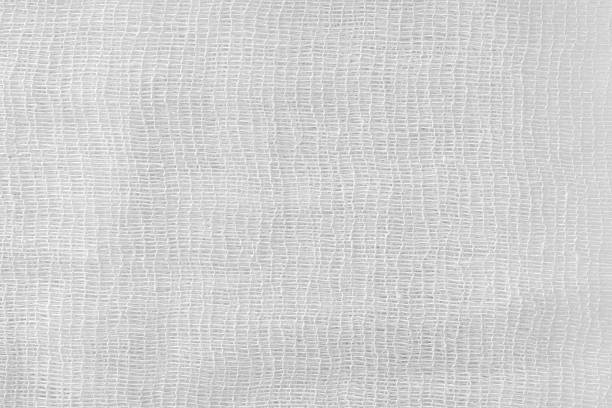 ペイントのガーゼのホワイトの質感 - gauze bandage textured white ストックフォトと画像