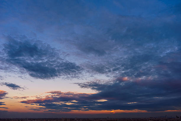 istock Clouds in twilight time over the cityscape 488978234