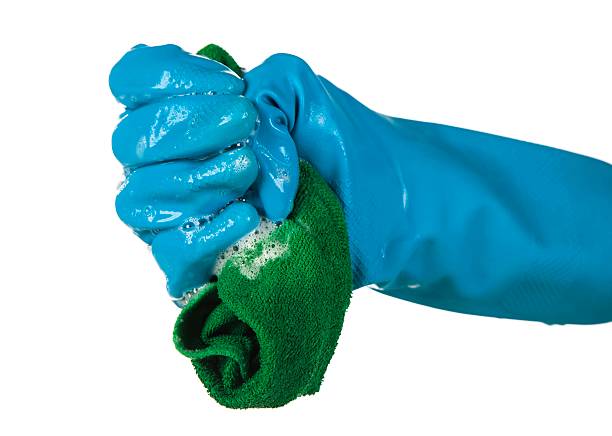 guantes de caucho azul sobre fondo blanco - nonconductor fotografías e imágenes de stock