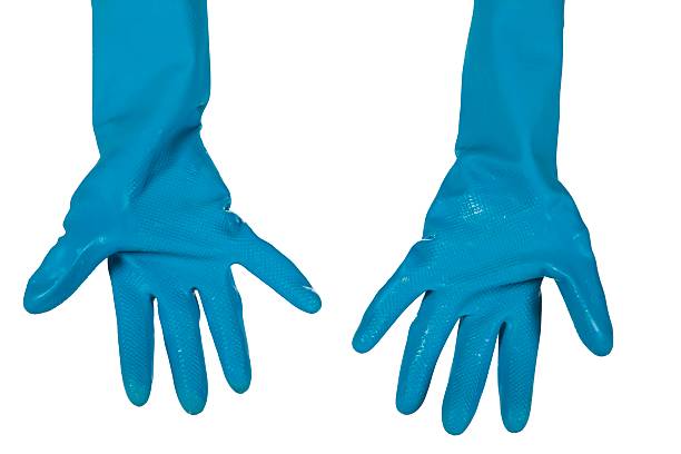 guantes de caucho azul sobre fondo blanco - nonconductor fotografías e imágenes de stock