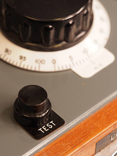 istock Test button and background knob of an old test apparatus 488980846