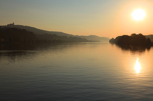 Cruising at sunrise on the Danube river.