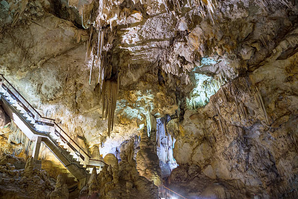 Interior of Natural Cave in Andalusia, Spain Nerja, Spain - August 25, 2014: Interior of Natural Cave in Andalusia, Spain -- Inside the Cuevas de Nerja are a variety of geologic cave formations which create interesting patterns nerja caves stock pictures, royalty-free photos & images