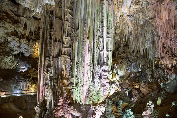 Interior of Natural Cave in Andalusia, Spain Nerja, Spain - August 25, 2014: Interior of Natural Cave in Andalusia, Spain -- Inside the Cuevas de Nerja are a variety of geologic cave formations which create interesting patterns nerja caves stock pictures, royalty-free photos & images