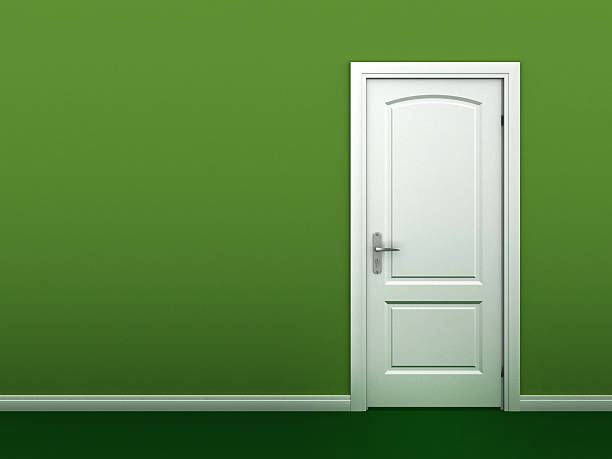 istock door in the green wall 488982605