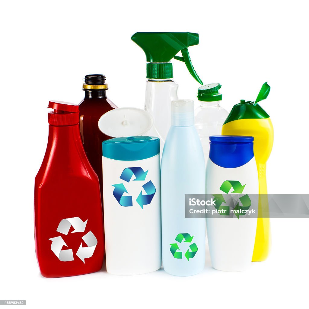 Recycling concept Recycling concept - garbage as empty plastic containers and bottles with recycling symbol 2015 Stock Photo