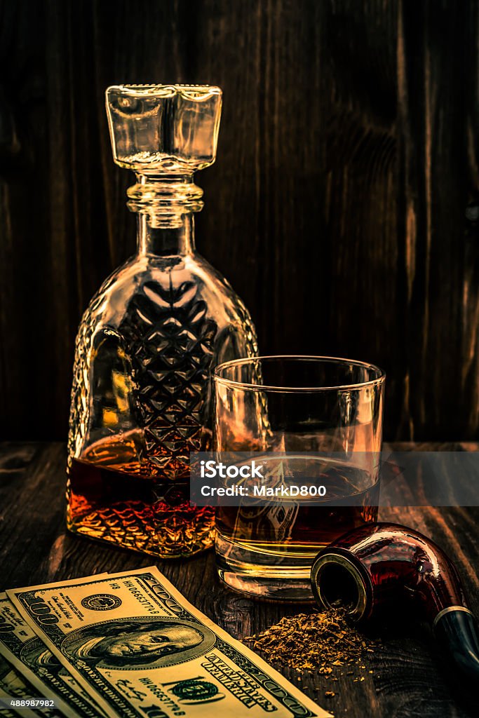 Glass Of Whiskey With A Money And Tobacco Pipe Stock Photo - Download Image  Now - 2015, Alcohol - Drink, Alcohol Abuse - iStock