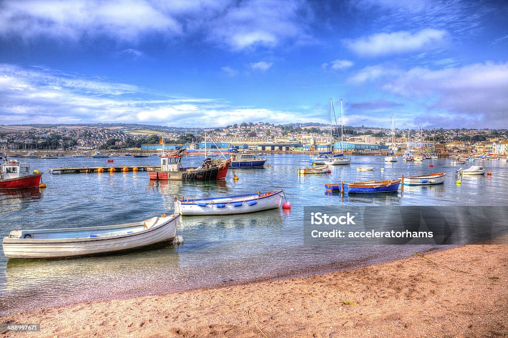 Boats Teign river Teignmouth Devon in bright colourful HDR Boats on Teign river Teignmouth Devon with bright colourful blue sky English artistic coastal scene in HDR Teignmouth Stock Photo
