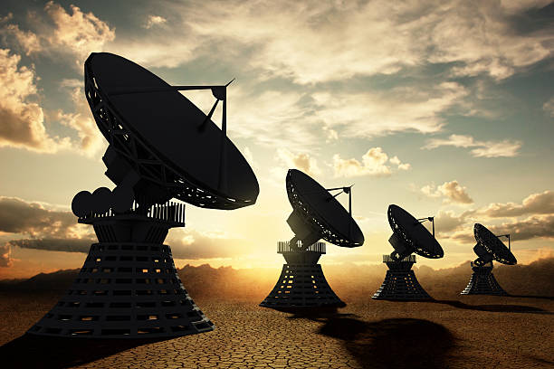istock Radiotelescopes silouette at sunset 488998339