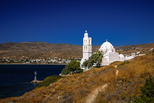Orthodox Church standing guard over the Port of Ios, Greece.