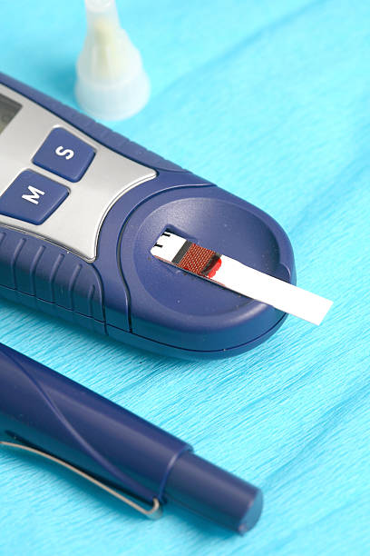 istock Diabetic is doing a glucose level finger blood test 488998795
