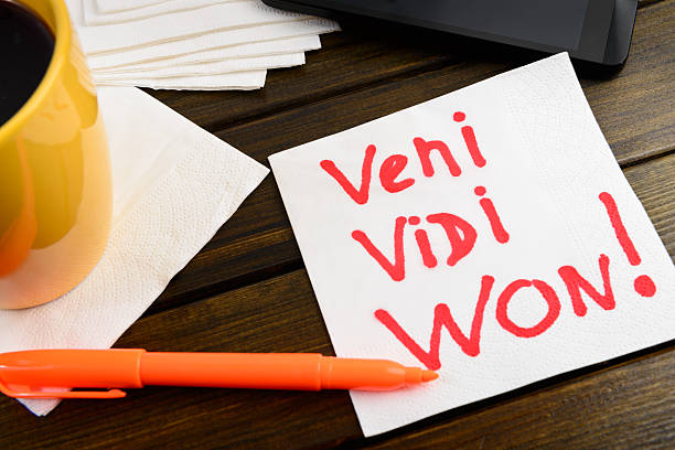 istock Veni vidi won writing on white napkin 488999006