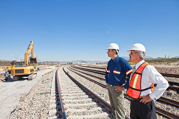 istock Engineer and Businessman at Railroad Construction 488999681