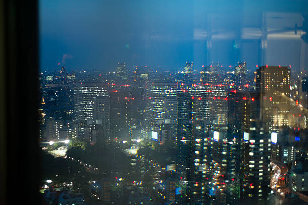 istock Night view of Tokyo through glass 489000841