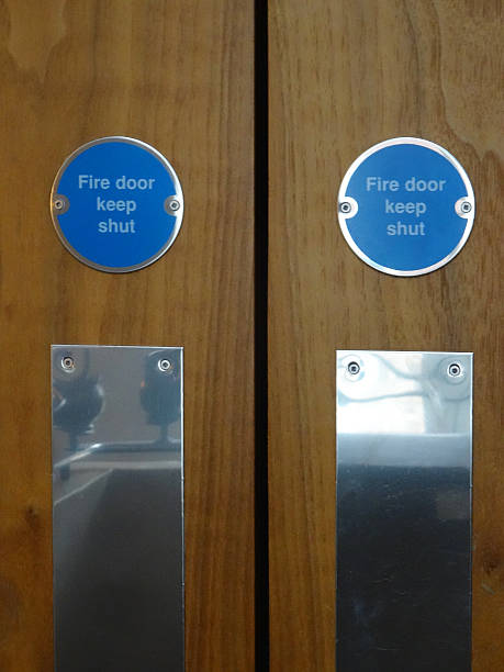 istock Image of blue circular safety 'Fire door keep shut signs' 489001824