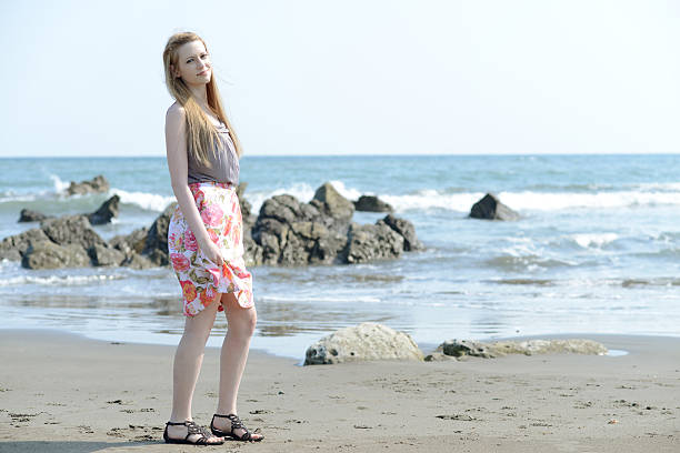 istock woman on the beach 489003103