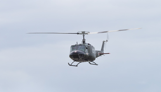 Yeovilton, UK - 11th July 2015: Vintage Bell 'Huey' helicopter flying at Yeovilton Air Day.