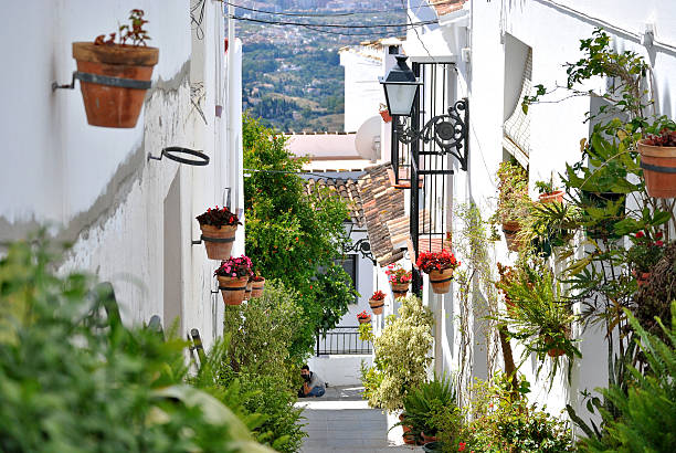 Village street Calle de Pueblo. Mijas, Malaga mijas pueblo stock pictures, royalty-free photos & images