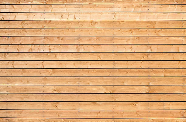 istock Uncolored new wooden wall background photo texture 489003637