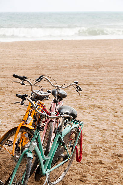 istock Multicolored bicycles parked by Barceloneta beach, Barcelona. 489004562