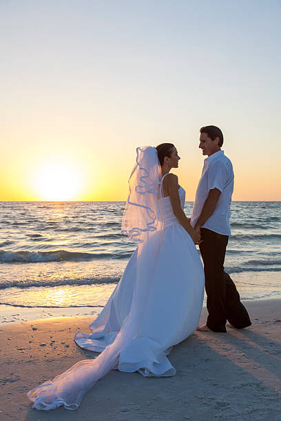 istock Bride & Groom Married Couple Sunset Beach Wedding 489004794