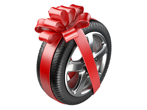 istock tyre with a wrapped red ribbon. 489005078