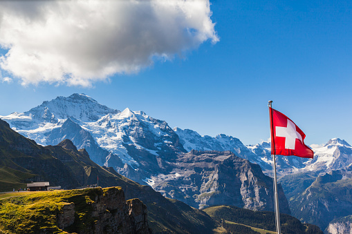Stunning view of the Jungfrau and mountain range of Bernese alps from Mannlichen cablecar station, Switzerland.