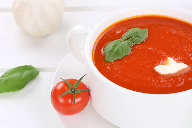 istock Fresh tomato cream soup with tomatoes in bowl 489007892