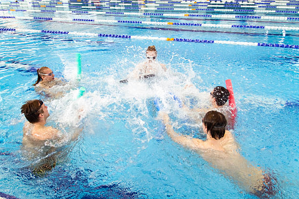 istock Group of friends in swimming pool 489010748