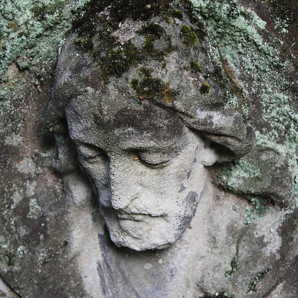 istock Jesus Christ statue against a background of gray stone 489011962