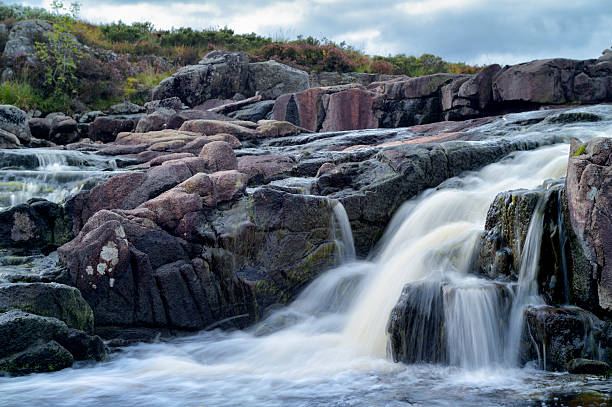 Small Scottish waterfall on a river in rural east Ayrshire