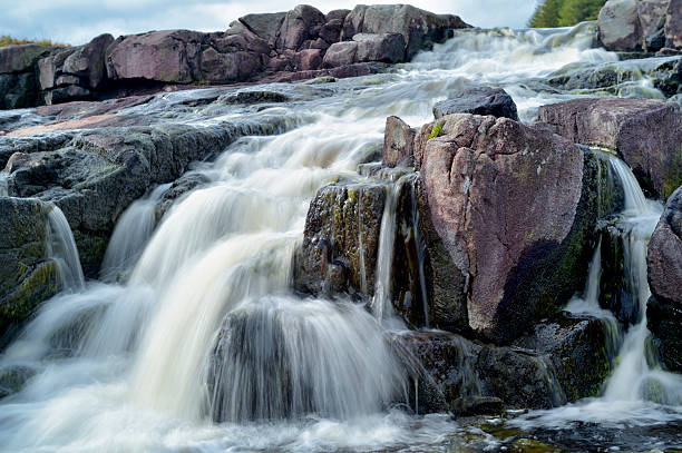 Small Scottish waterfall on a river in rural east Ayrshire