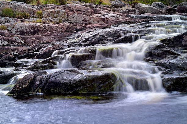 Small Scottish waterfall on a river in rural east Ayrshire