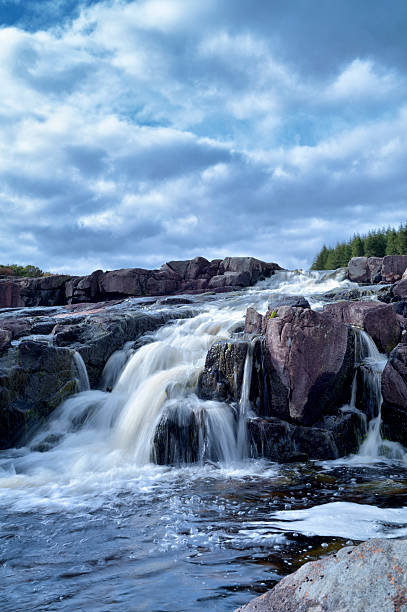 Small Scottish waterfall on a river in rural east Ayrshire