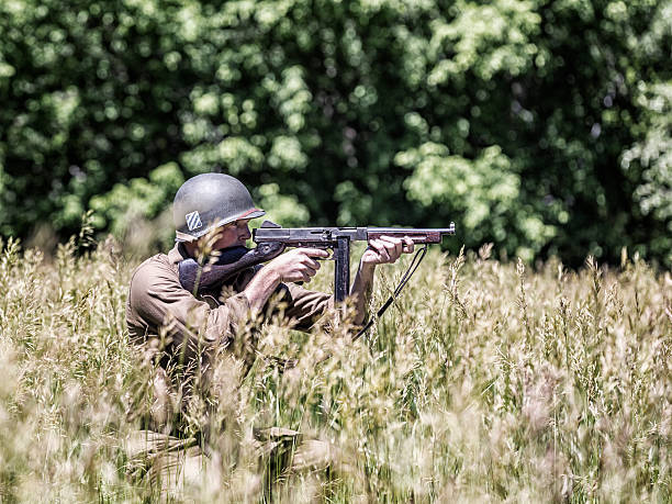 istock World War II US Army Infantry Sniper Soldier Aiming Rifle 489012530