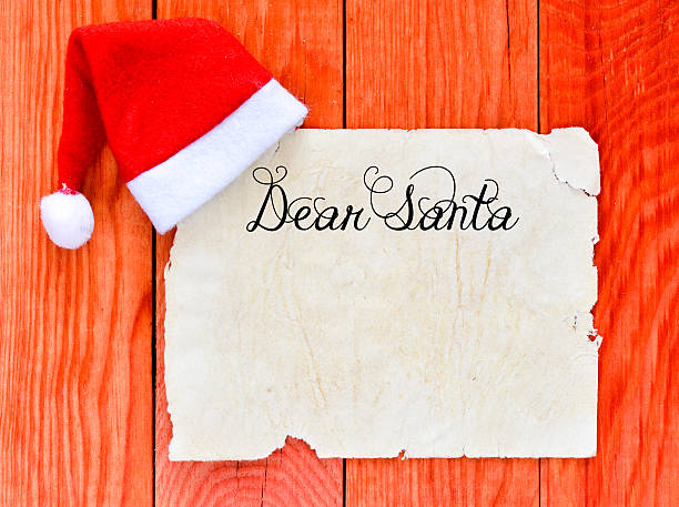 istock Merry christmas letter with santa hat 489030136
