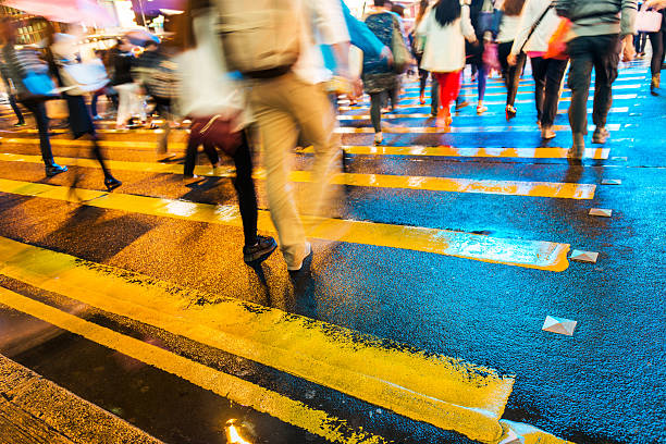 istock people crossing street 489031346