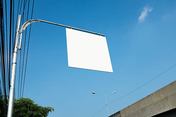 istock Blank White Road Sign Isolated on a sky Background 489031514