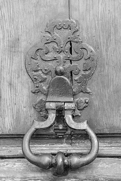 istock Knocker on a wooden door 489034494