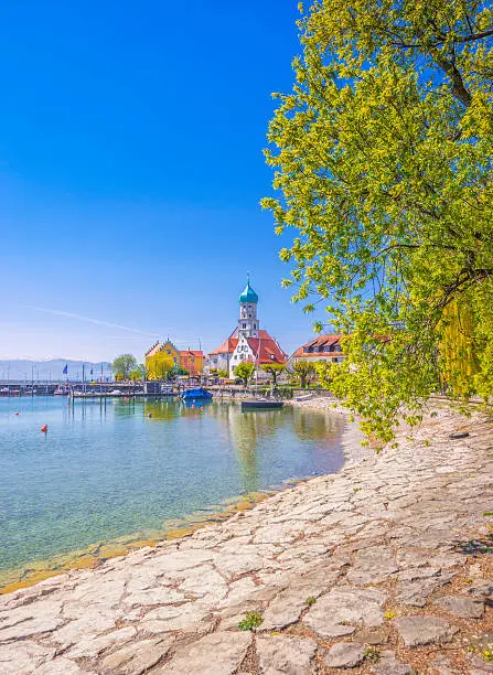 Beautiful view on the picturesque peninsula town and harbour of Wasserburg at Lake Constance (Bodensee).