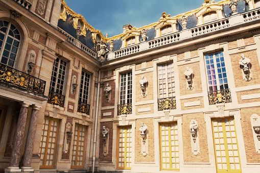 Versailles, France - September 17, 2015: Facades of the Palace of Versailles in France. It was an official residence of the kings of France and is now a World Heritage Site.