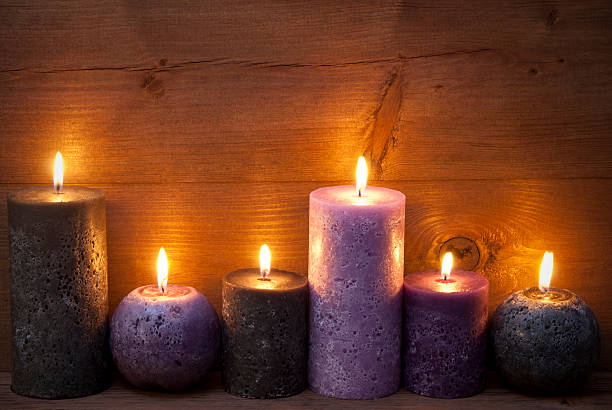 istock Christmas Decoration With Puprle And Black Candles 489037220
