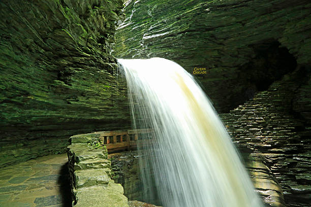 Cavern Cascade Waterfall in Watkins Glen State Park, New York watkins glen stock pictures, royalty-free photos & images