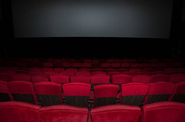 istock Empty seat on row in thearter back side to screen 489041495