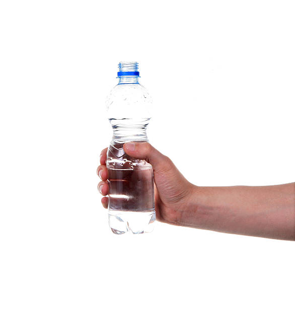 istock Hand with water bottle isolated on white background 489042481
