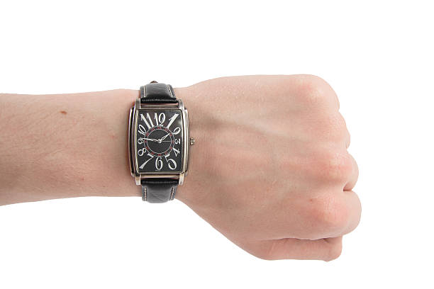 istock human hand with watch on the white background 489042497